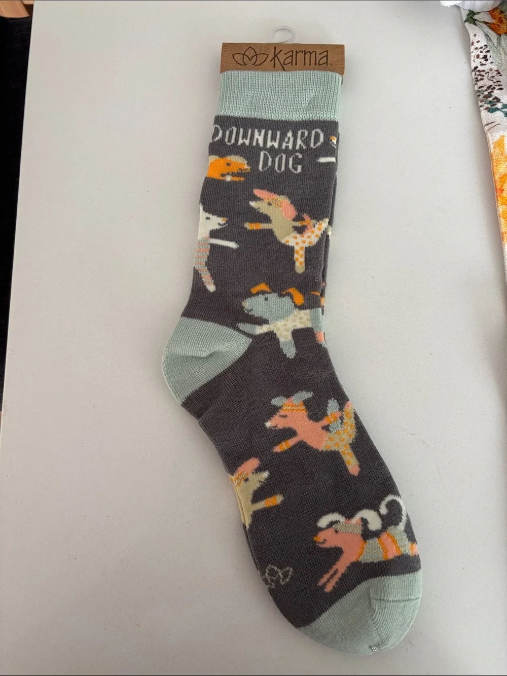 Karma Gray Crew Socks with Mint Cuff and Multicolor Dog Pattern